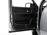  Inside of driver's side open door, window open photo